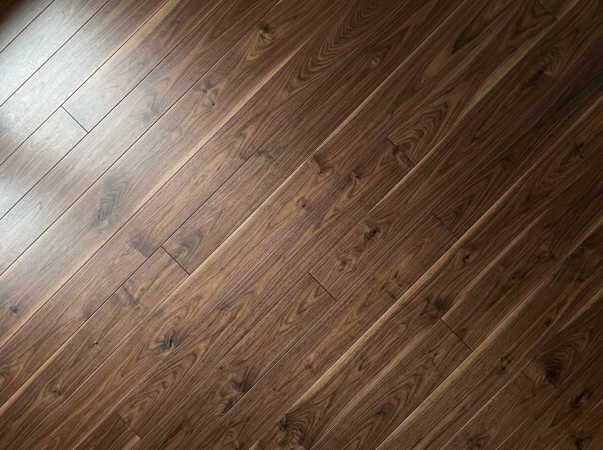 Close view of a dark walnut hardwood floor